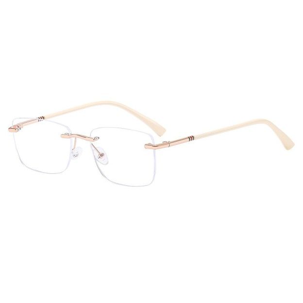 Rimless glasses with gold-tone accents and light-colored temples